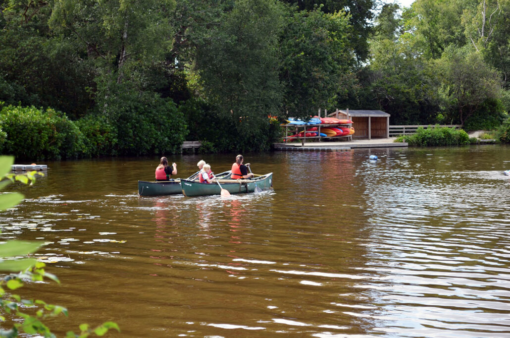 Canoeing on the lake at Avon Tyrrell