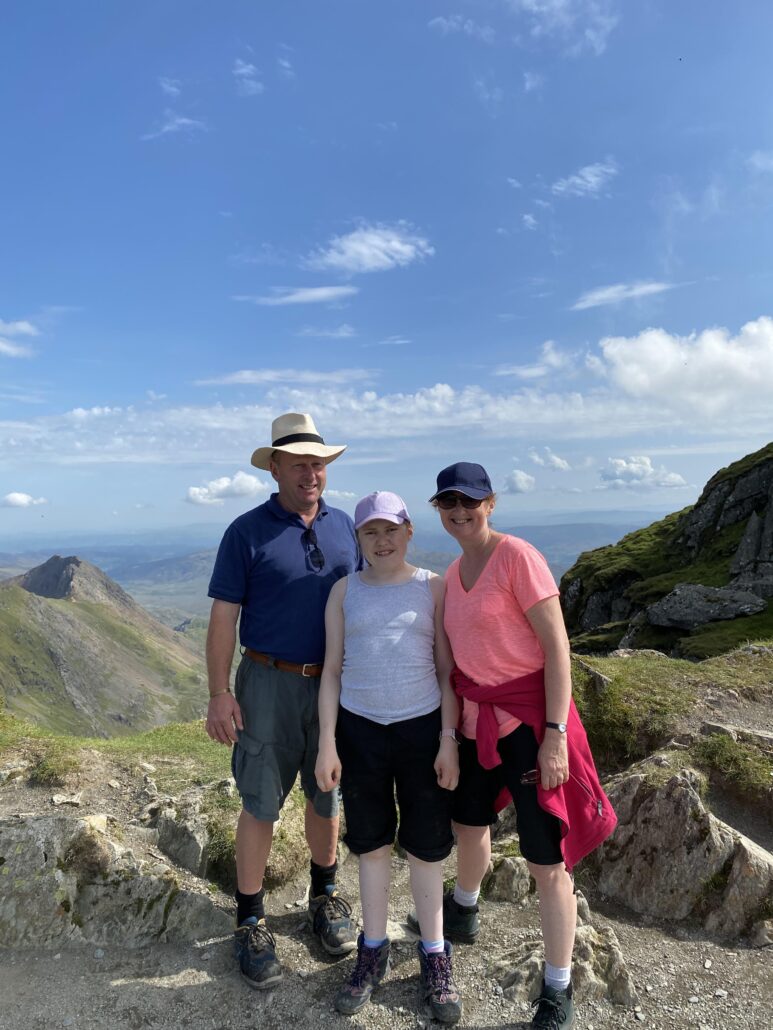 Katherine with mum, Rachel, and stepfather, Paul, at summit