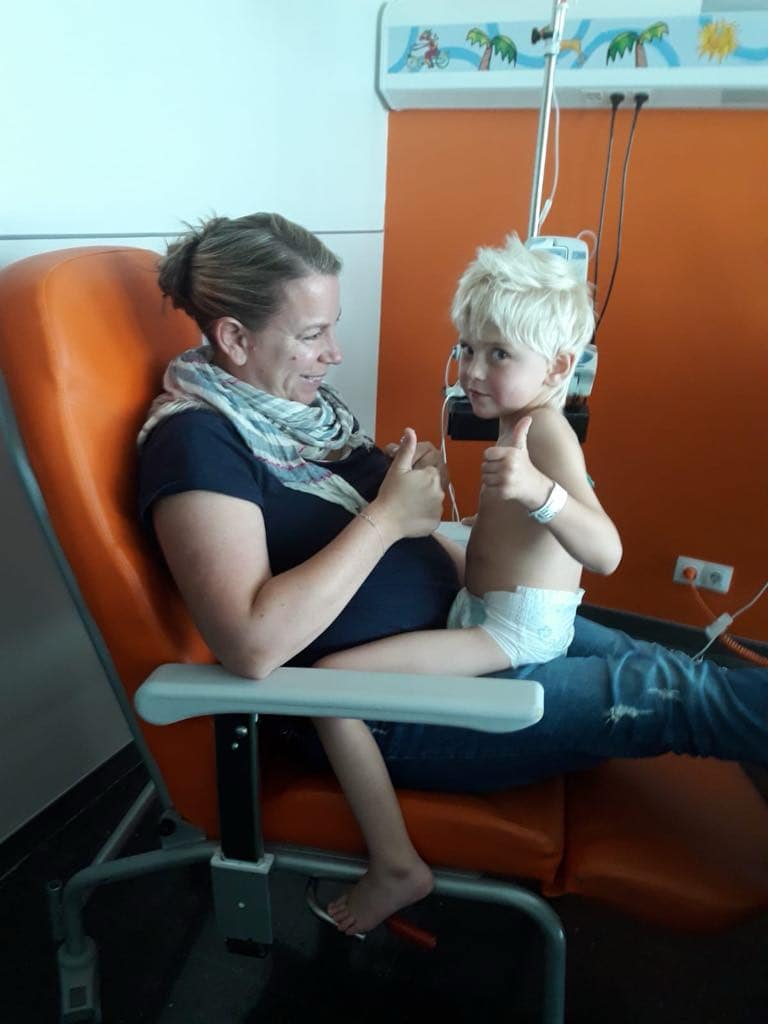 Theo slowly on the road to recovery and out of bed on the hospital ward