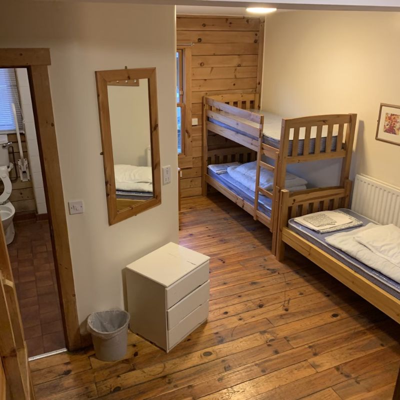 Room with multiple beds at Barnstondale