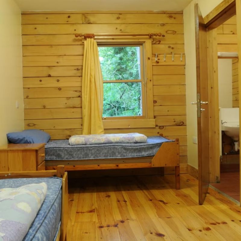 Log cabin style bedroom at Barnstondale