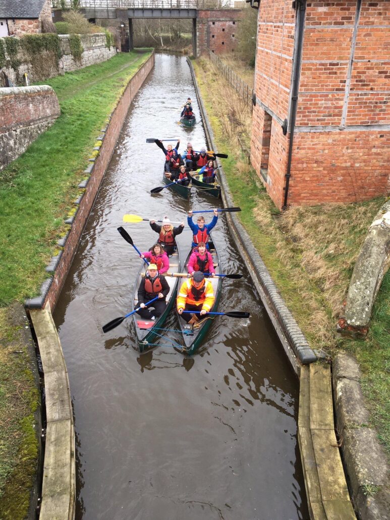 Katherine canoeing with other students at St Joseph's
