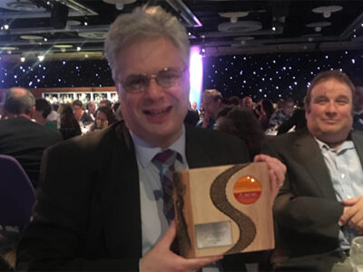 Trustee Nigel Over holding SCVO Award